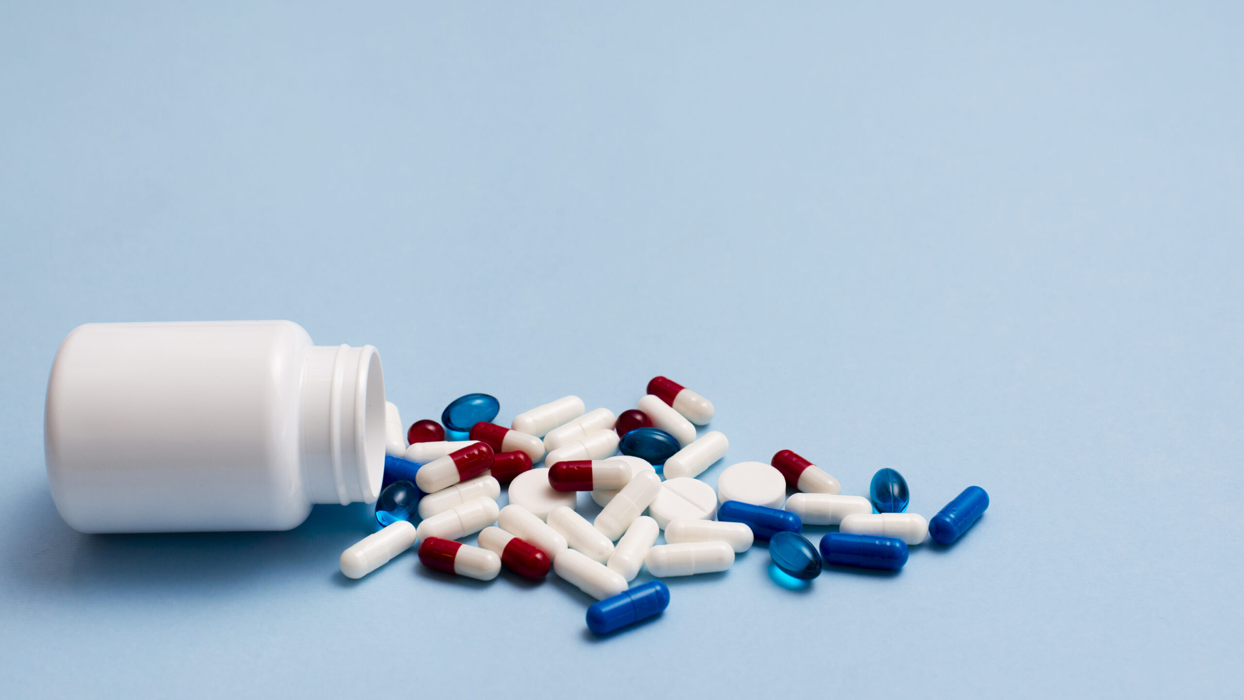 white-pill-container-blue-background